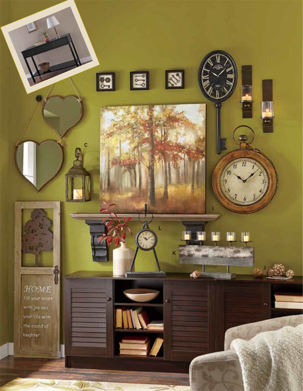 Olive green wall with heart mirrors, clocks, a Fall forest canvas, lit sconces, and a dark wood credenza with shutter doors.