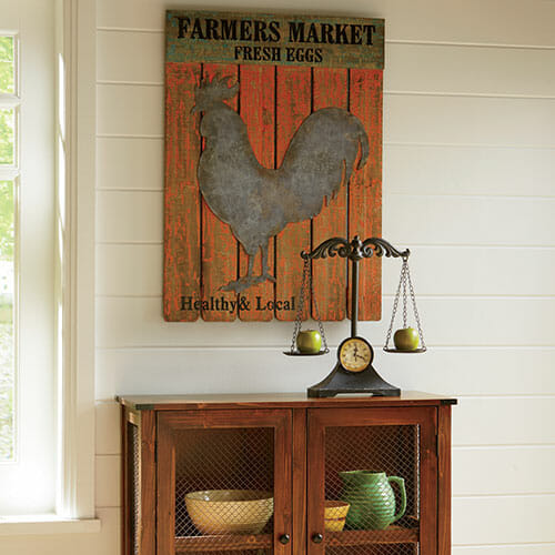 Farmhouse wood plank Fresh Eggs wall art with a tin chicken silhouette on a distressed orange background.