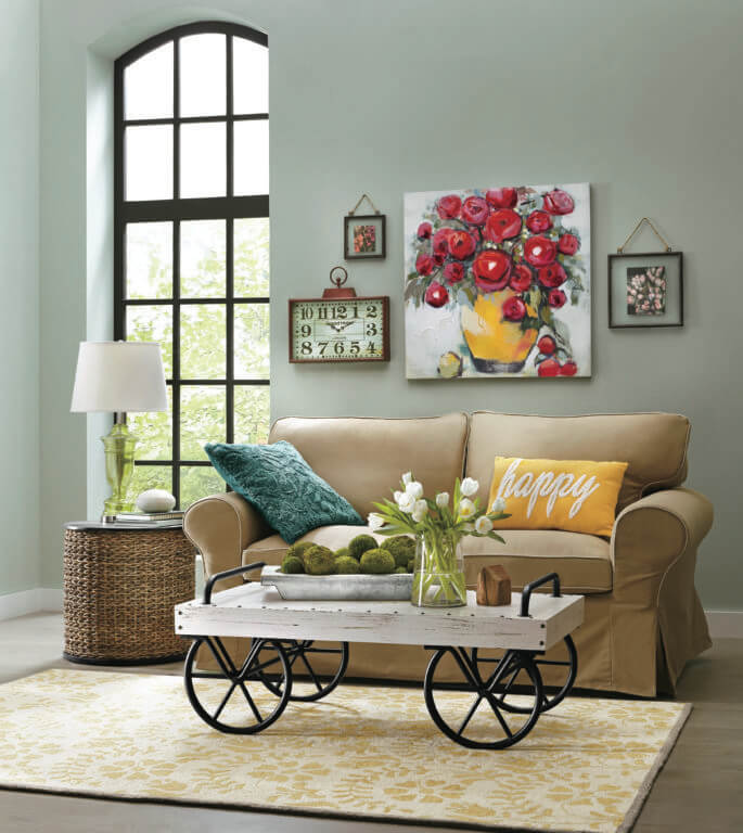 Living room decor, brown loveseat with wheeled coffee table