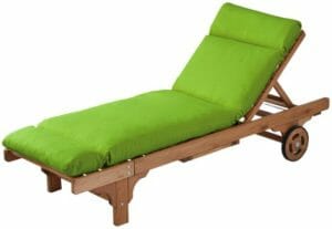 A green seat and back cushion on a wood lounge chair.