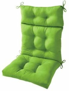 A green tufted seat and high back chair cushion with ties.