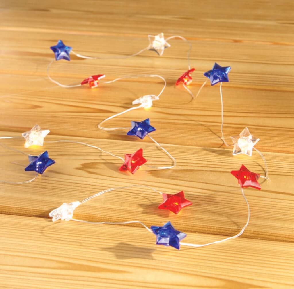 a string of red, white, and blue star outdoor lights