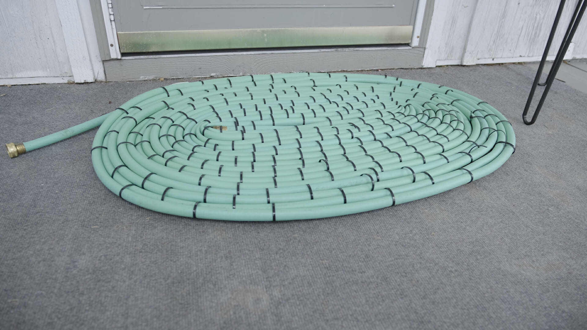 garden hose made into a welcome mat