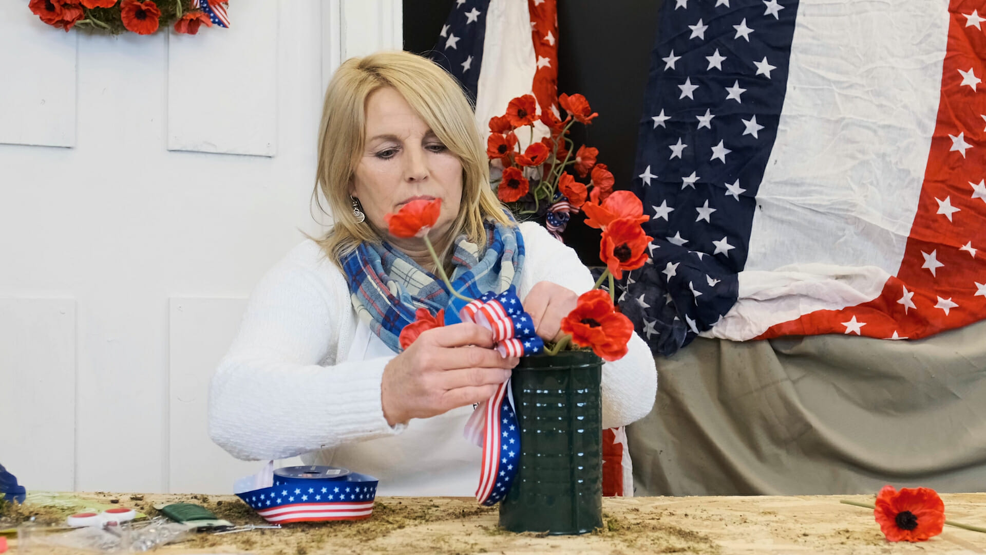 Memorial day poppy arrangement - add the bow