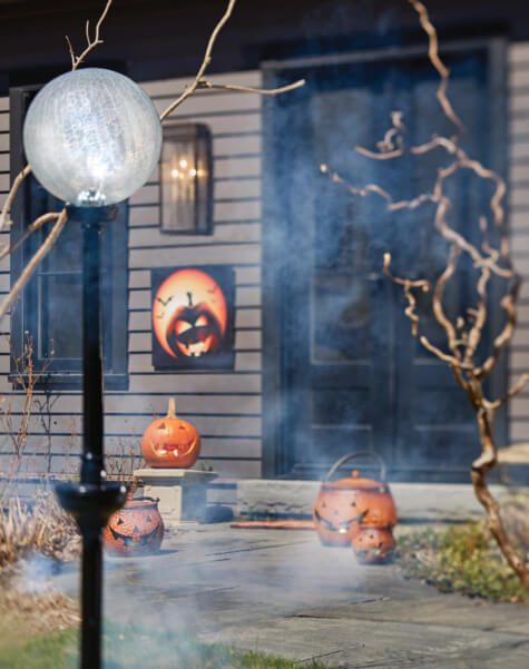 halloween front door with jack-o-lanterns