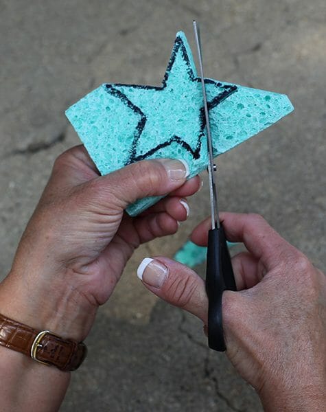 cutting out a star sponge stamp