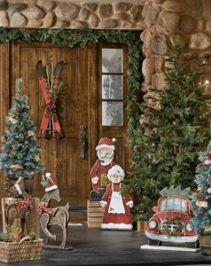 Christmas front door with skis and wood cutouts