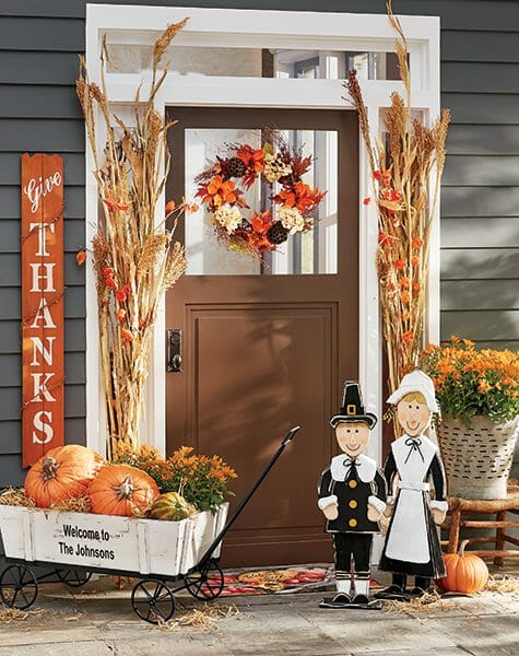 wood cutout pilgrims and autumn front door