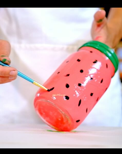 painting watermelon Mason jar with seeds