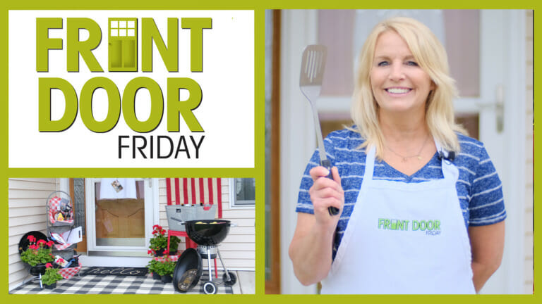 Front Door Friday – Smiling woman in an apron with spatula – Porch with a grill, red geraniums, and wash tub with beverages.