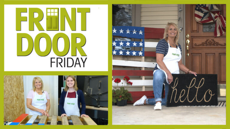 Front Door Friday – Two smiling women in aprons – Porch with a USA flag painted on a pallet, and a black hello sign.