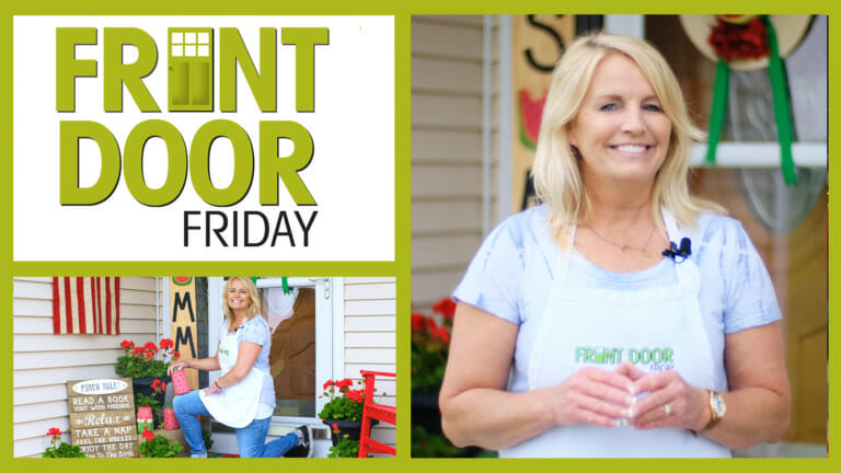 Front Door Friday – A smiling woman in a Front Door apron, a front porch with red geraniums and DIY wood watermelons.